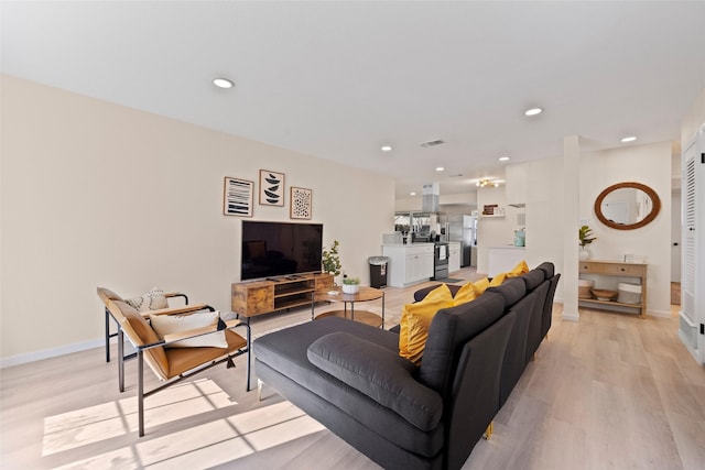 living room featuring light hardwood / wood-style floors