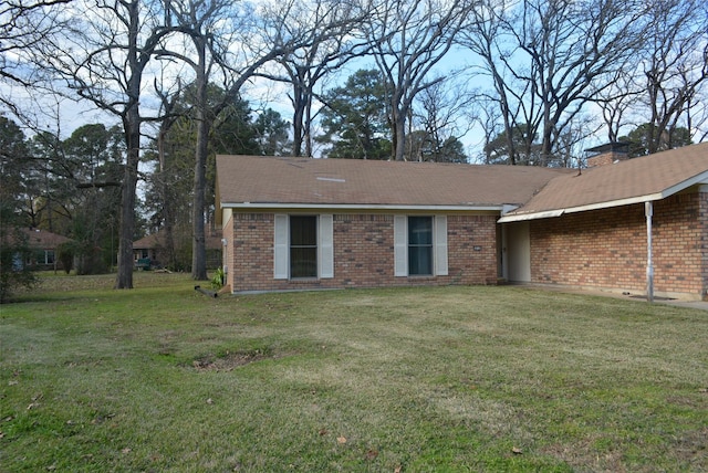 exterior space with a lawn