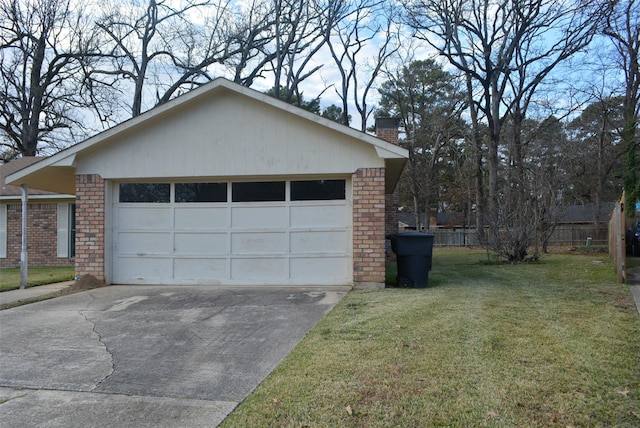 garage with a lawn