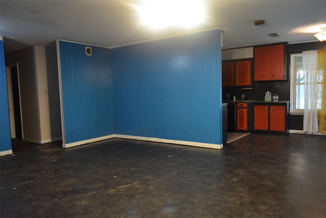 interior space with a textured ceiling