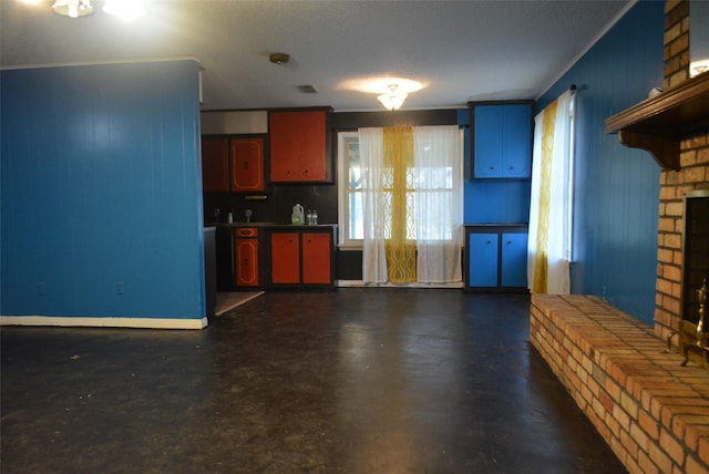 kitchen featuring a fireplace