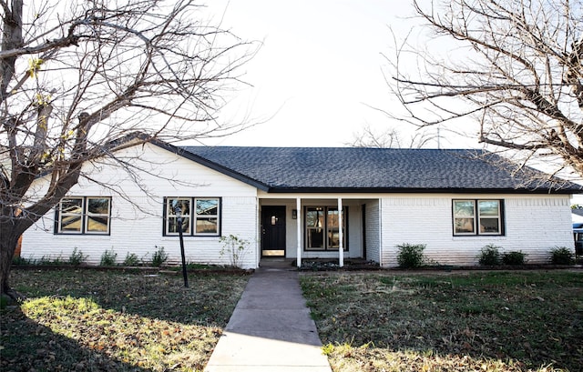 ranch-style house with a front yard