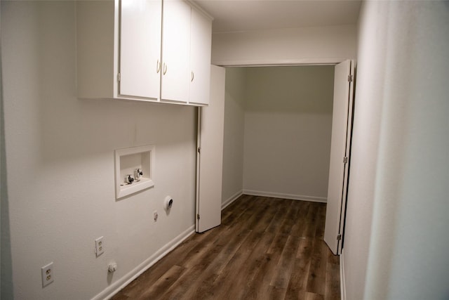 washroom featuring cabinets, washer hookup, dark hardwood / wood-style floors, and gas dryer hookup