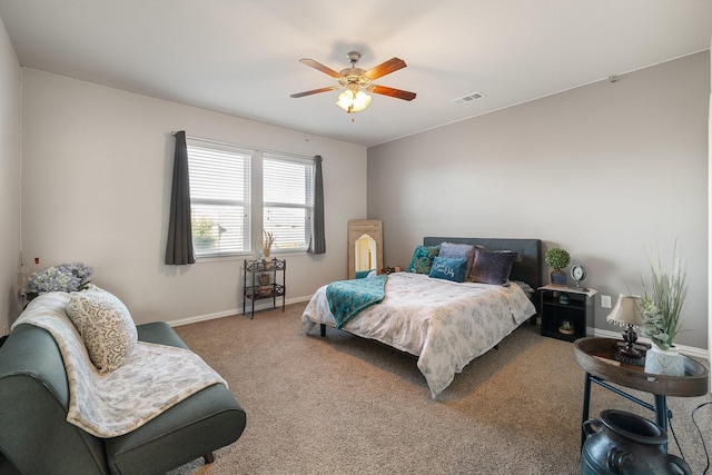 bedroom with ceiling fan and carpet floors