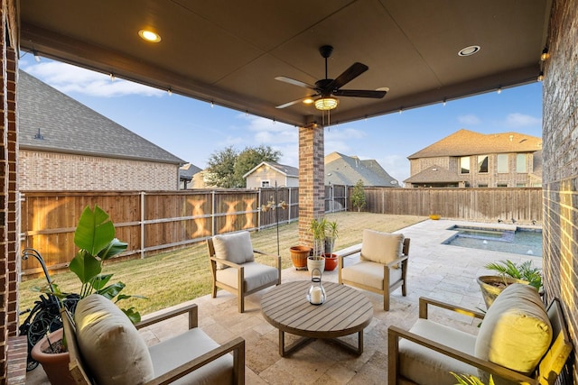 view of patio / terrace featuring ceiling fan and an outdoor living space