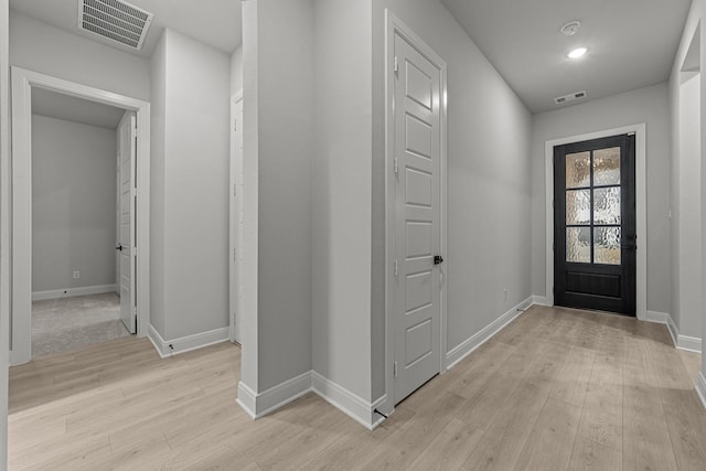 hall featuring light hardwood / wood-style floors