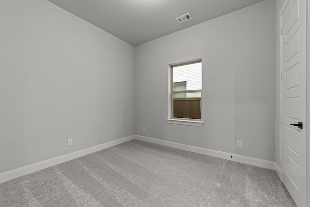 spare room with carpet floors