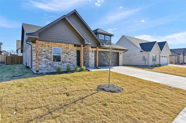 view of front facade featuring a garage and a front yard