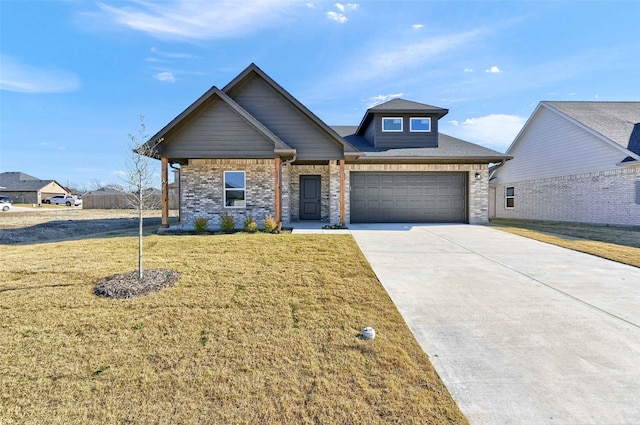 craftsman house with a garage and a front yard