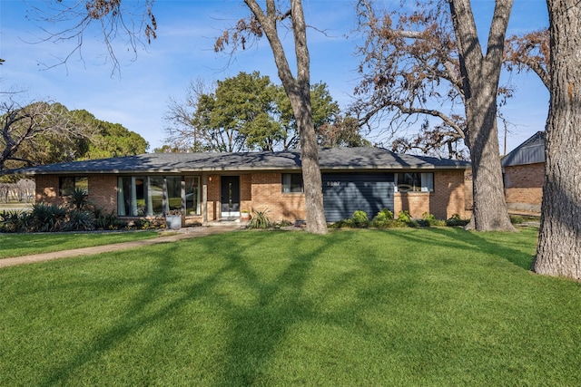 ranch-style home with a front yard