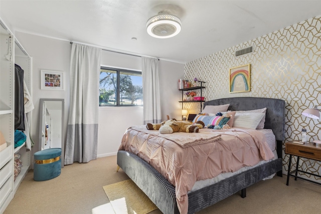 bedroom with light colored carpet