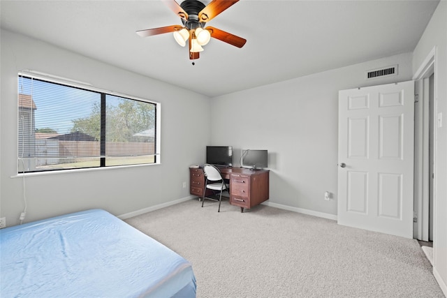 carpeted bedroom with ceiling fan