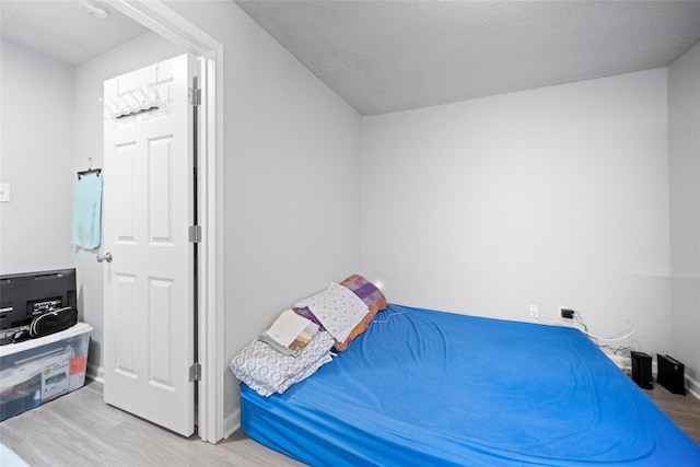 bedroom featuring light hardwood / wood-style floors