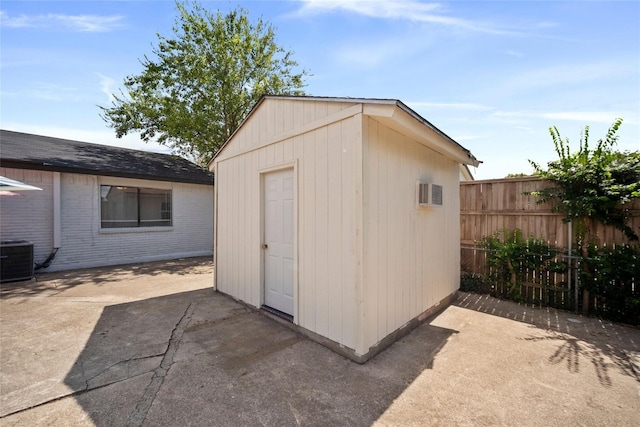 view of outdoor structure with central AC