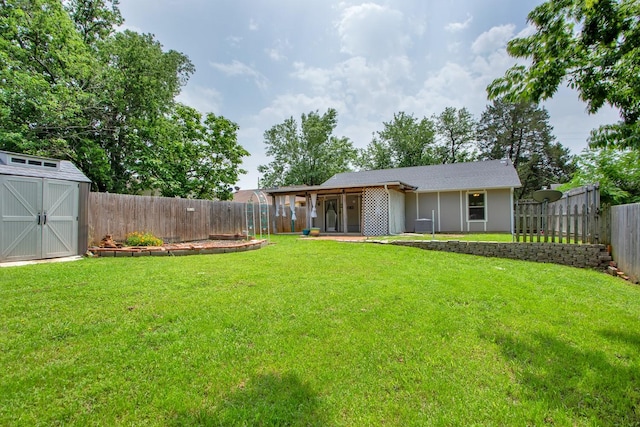 view of yard with a storage shed