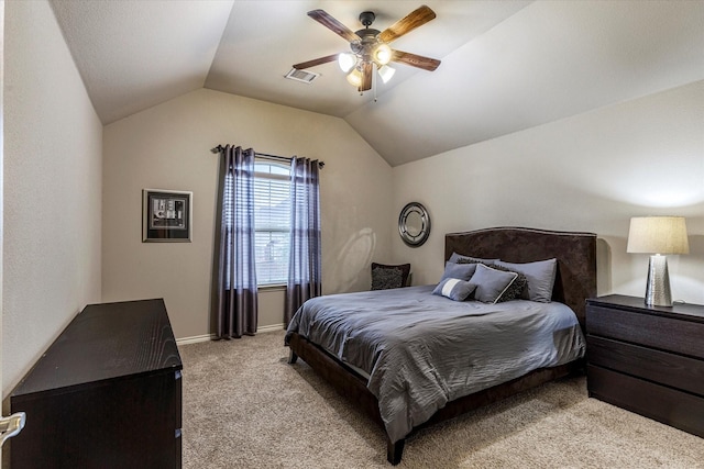 carpeted bedroom with lofted ceiling and ceiling fan