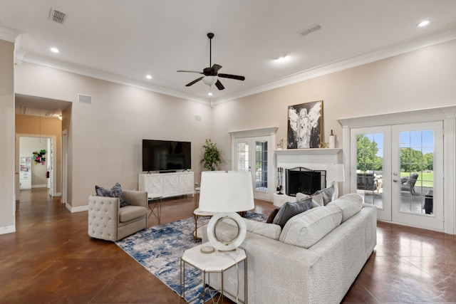 living room featuring ceiling fan, french doors, and ornamental molding