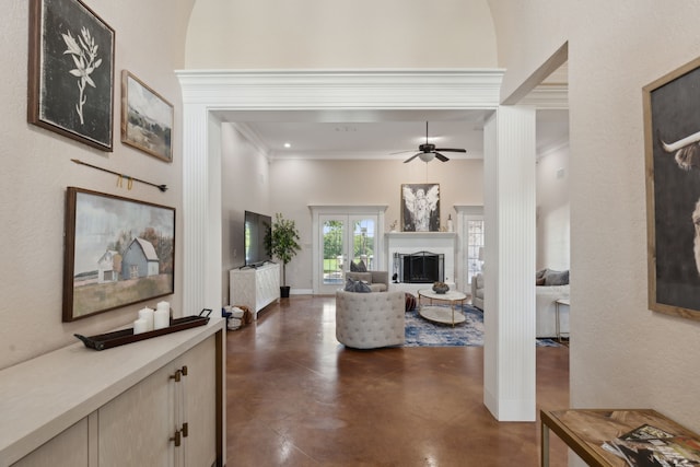 living room featuring ceiling fan, french doors, and a towering ceiling