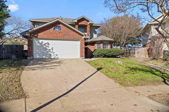 front facade with a front yard and a garage