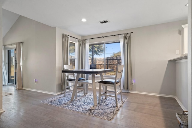 dining area with hardwood / wood-style flooring