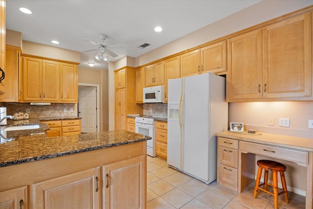 kitchen featuring decorative backsplash, light tile patterned floors, ceiling fan, and white appliances