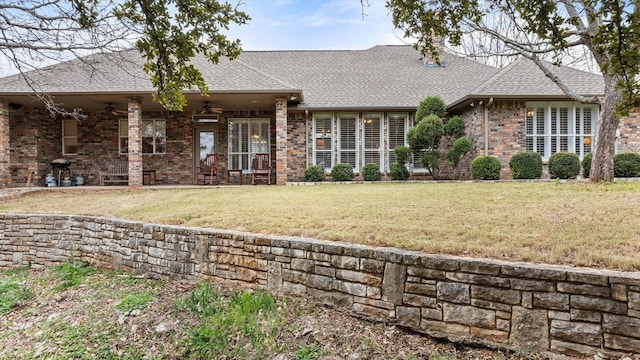 view of front of house with a front lawn