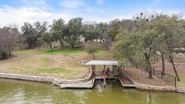 dock area with a water view