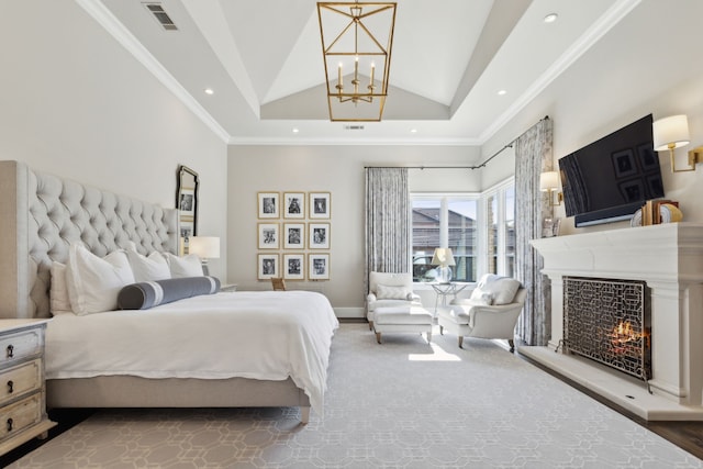 bedroom featuring crown molding, recessed lighting, visible vents, vaulted ceiling, and a warm lit fireplace