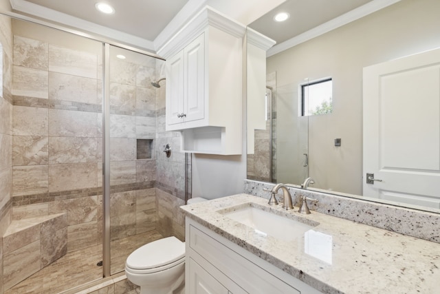 full bath featuring toilet, crown molding, vanity, a shower stall, and recessed lighting