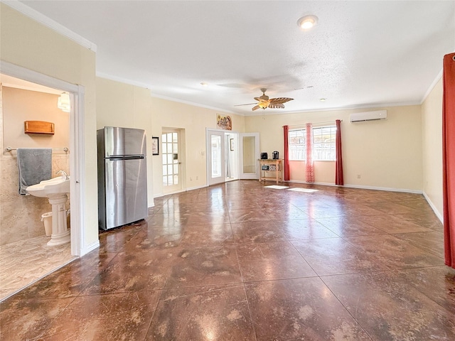 unfurnished living room with a wall mounted air conditioner, ceiling fan, and crown molding