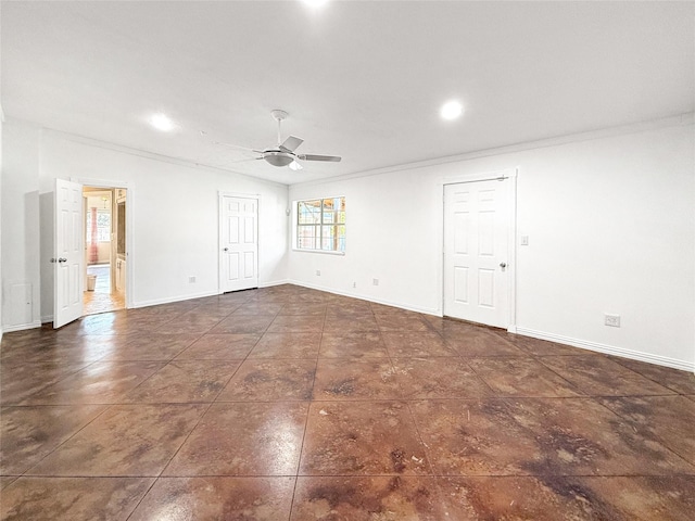 empty room with crown molding, lofted ceiling, and ceiling fan