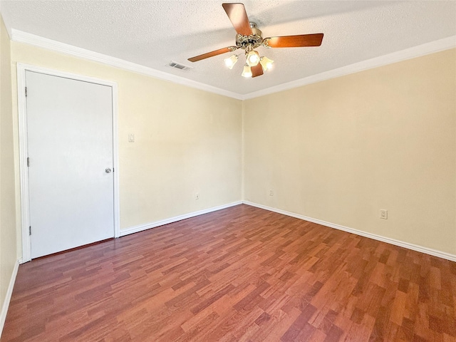 unfurnished room with crown molding, ceiling fan, hardwood / wood-style flooring, and a textured ceiling