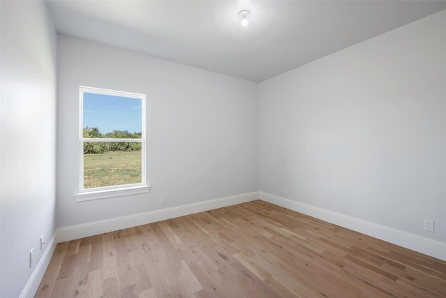 empty room with light wood-type flooring