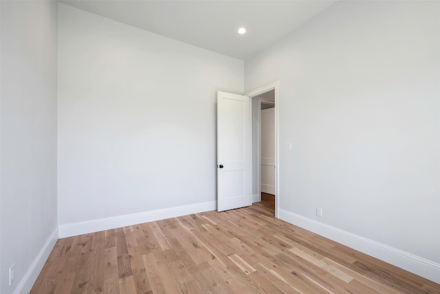 spare room featuring light wood-type flooring