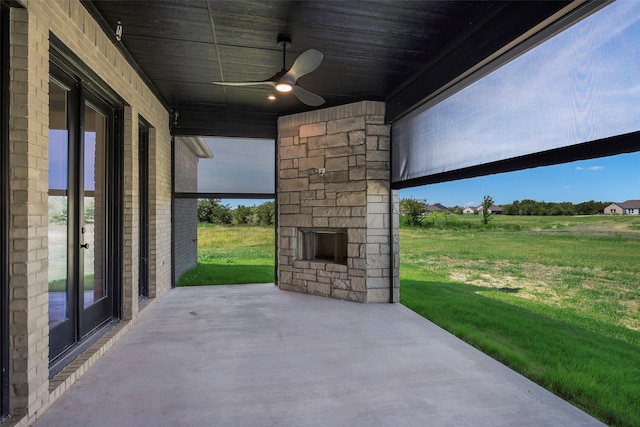 view of patio featuring ceiling fan