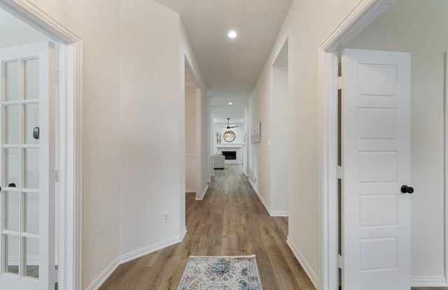 corridor featuring light wood-type flooring