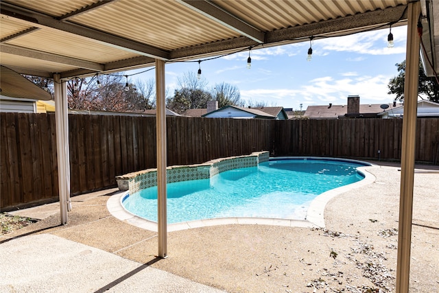 view of swimming pool featuring a patio