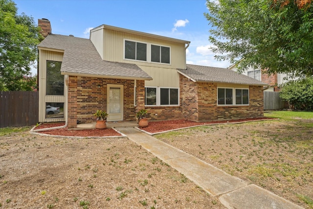 view of front of home with a front lawn