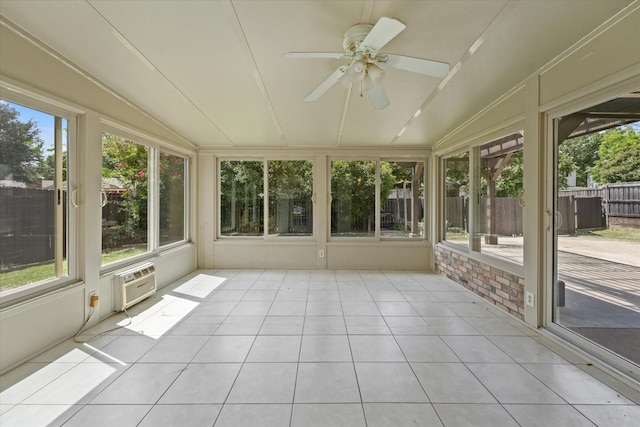 unfurnished sunroom featuring ceiling fan and lofted ceiling