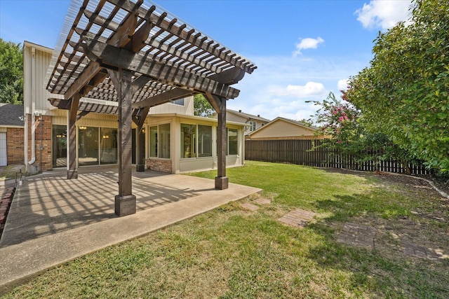 view of yard with a pergola and a patio