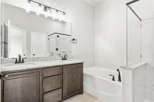 bathroom with separate shower and tub, tile patterned flooring, and vanity