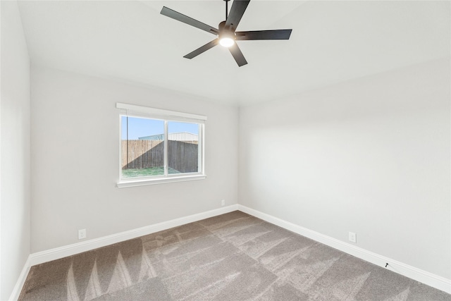 empty room with carpet floors and ceiling fan