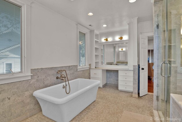 interior space with crown molding, french doors, and light hardwood / wood-style floors