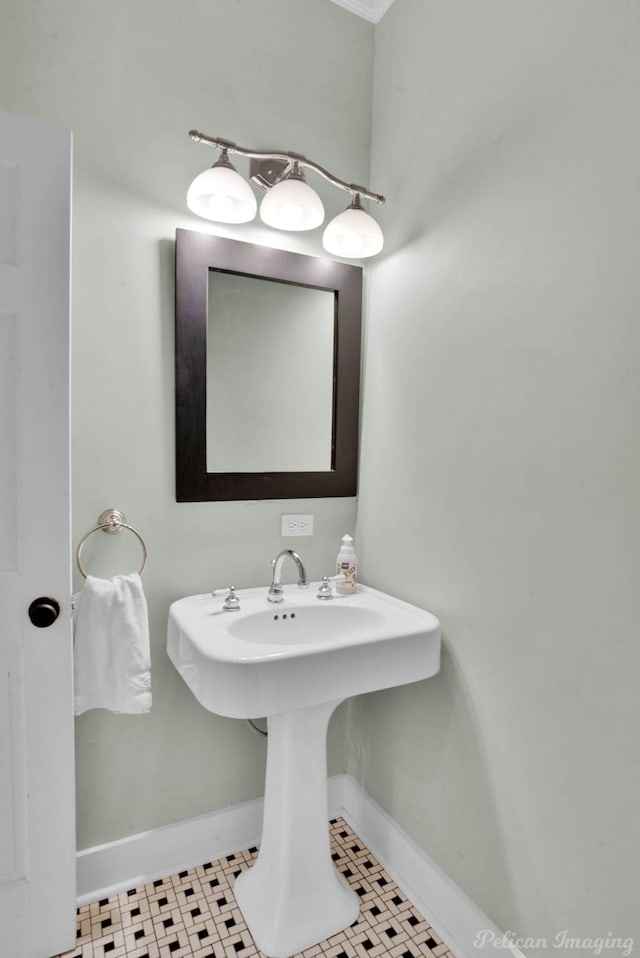 bathroom with tile patterned floors