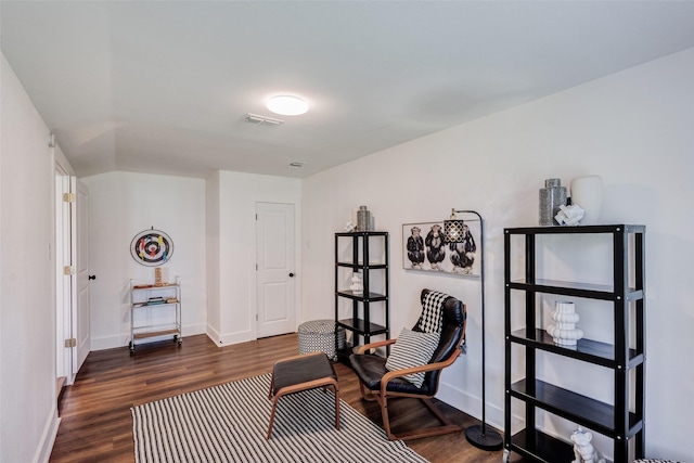 living area featuring dark hardwood / wood-style floors