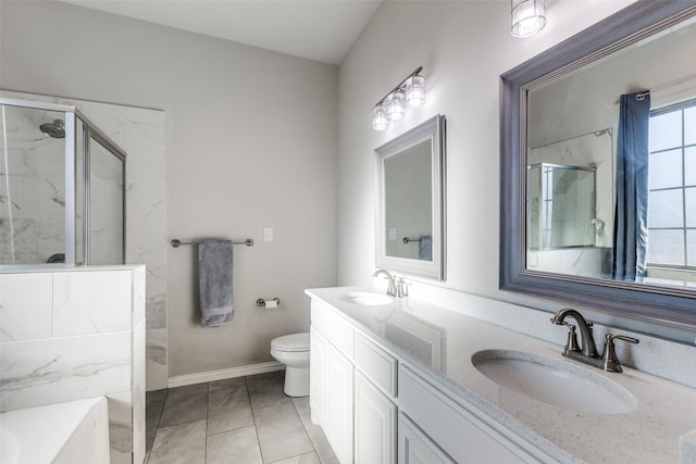 full bathroom with tile patterned floors, toilet, vanity, and independent shower and bath