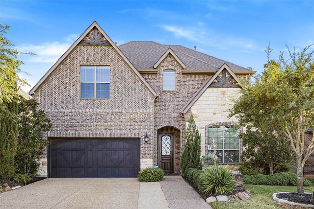 view of front of property featuring a garage