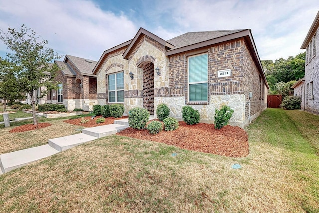 view of front facade with a front yard