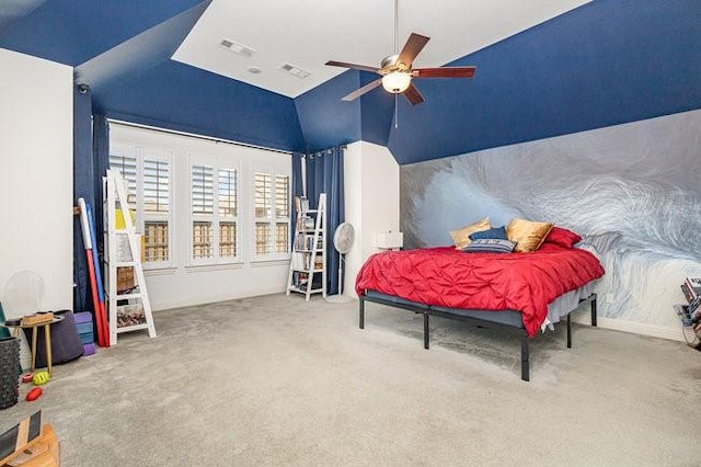 carpeted bedroom featuring vaulted ceiling and ceiling fan