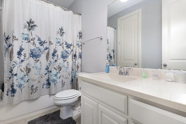 full bathroom with vanity, tile patterned flooring, toilet, and shower / bathtub combination with curtain